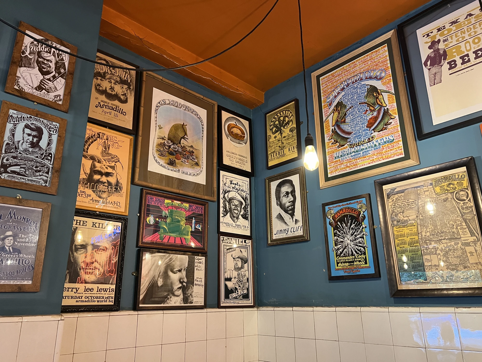Original concert posters from Texas venues, including the Armadillo World Headquarters