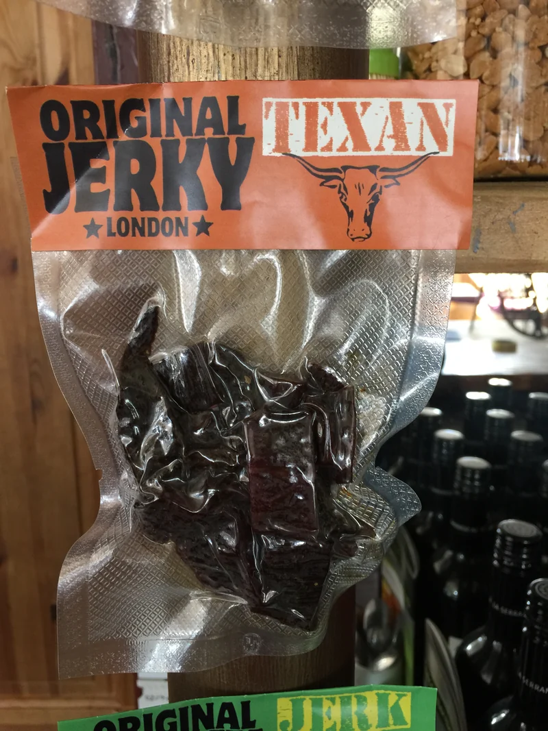 An early Original Texan Jerky packet with its original orange label